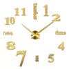 A modern 3D acrylic wall clock with DIY sticker numbers showing the time.