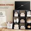 A black wooden media stand with open shelves and compartments used to organize electronics and accessories.