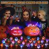 A collection of glowing Halloween rings and pumpkin decorations for kids.