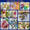 Assortment of colorful resin jewelry pieces and molds for casting and coating.