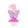 A birthday candle decorated with pink glitter and a purple butterfly shape.