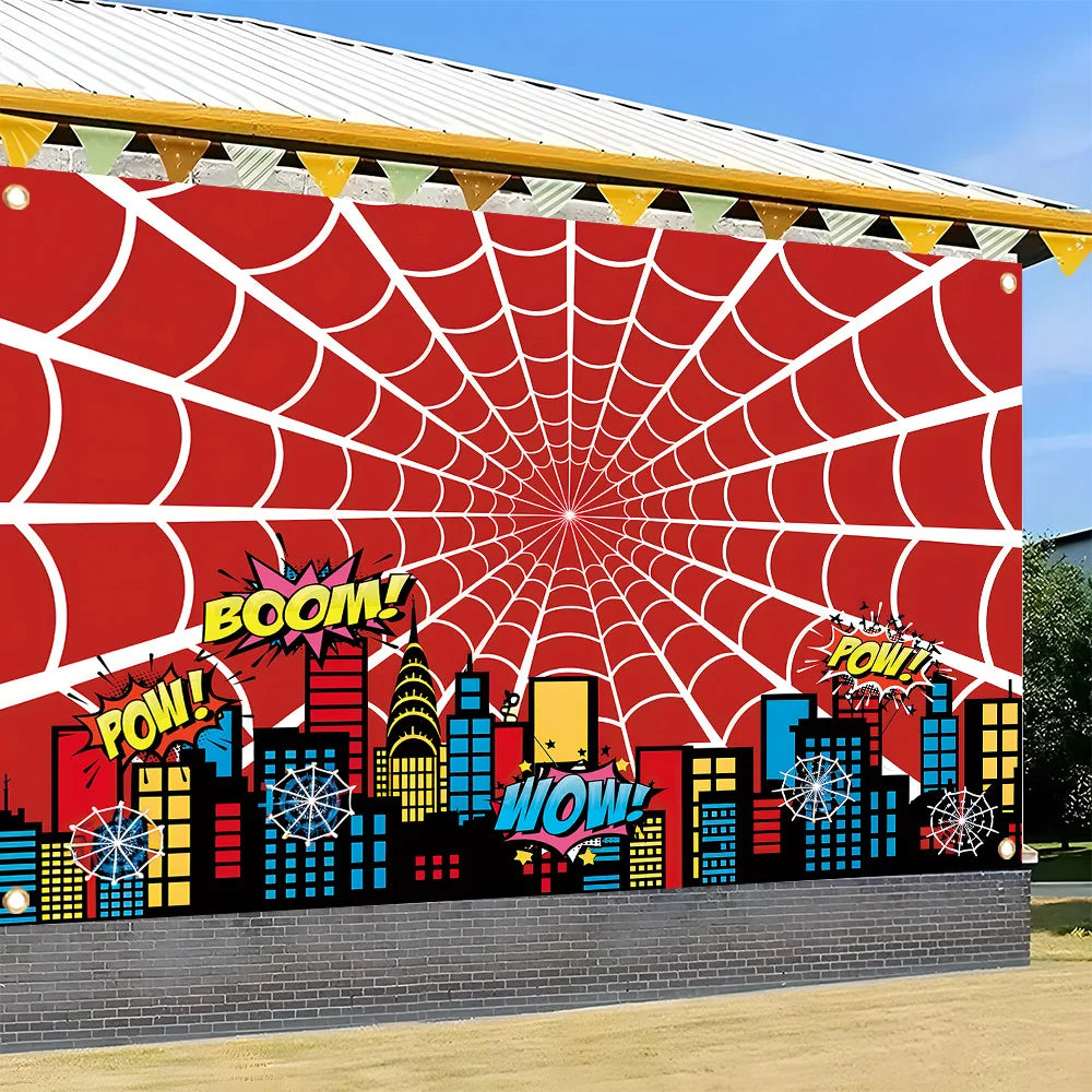A large banner featuring a red spiderweb design over a cityscape with buildings and colorful text like BOOM WOW POW