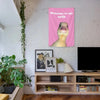 Pink wall tapestry featuring a yellow duck welcoming viewers to its crib
