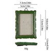 A rectangular vintage baroque resin picture frame with a green frame and light gray interior, shown with dimensions.