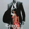 A movie poster featuring a man and a woman in dramatic lighting for Casino Royale.