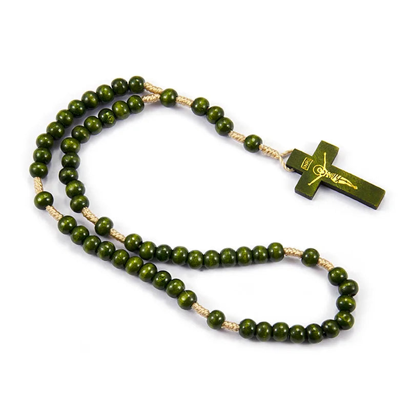A wooden rosary beads necklace featuring a crucifix pendant on a light colored cord.