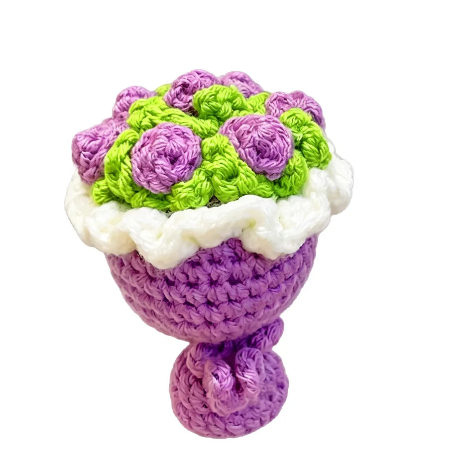 Handmade crochet flower bouquet keychain featuring purple and lime green flowers