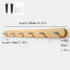 A light wood wall hook rack with four wooden hooks is shown alongside packaging and dimensions.