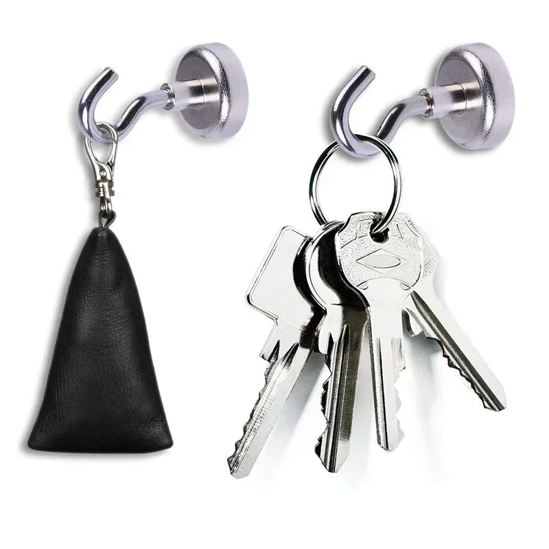 A pair of heavy duty stainless steel magnetic hooks with a black leather tag and keys