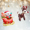 A 3D foil balloon set featuring a red Santa sleigh decorated with deer and elk figures against a sparkling background.