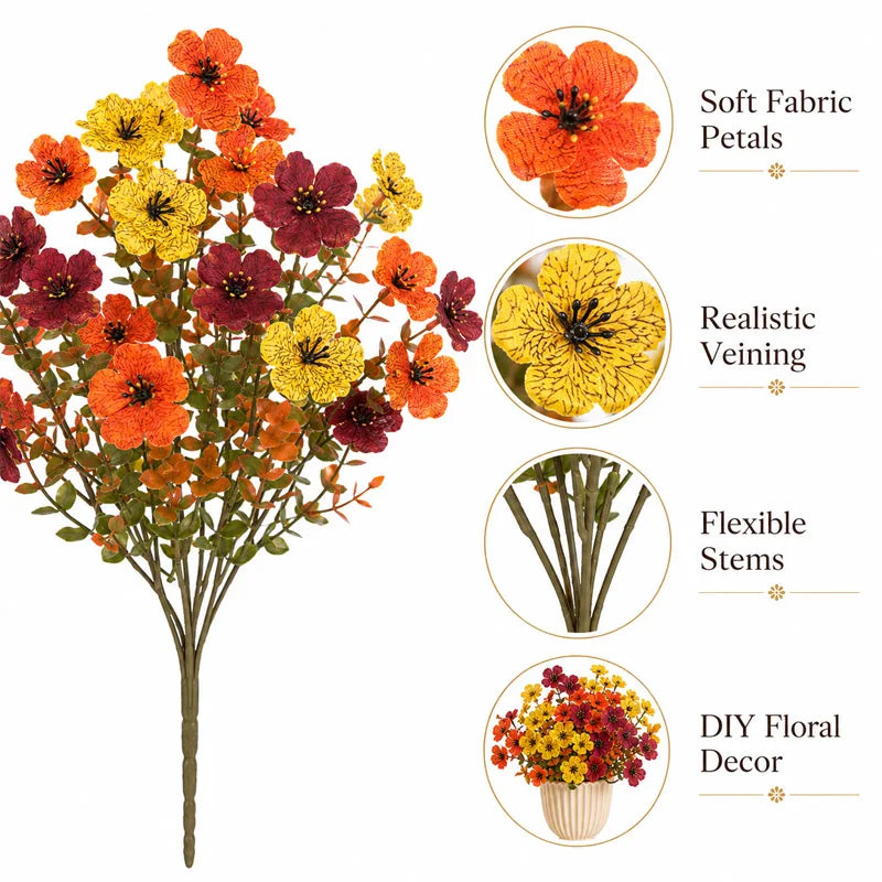 A bouquet of vibrant artificial pansy flowers in shades of orange, yellow, and deep red.