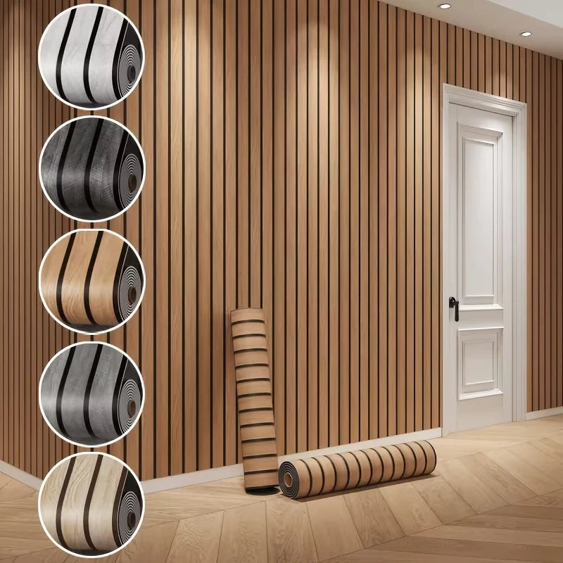 Vertical strips of faux wood grain self-adhesive wallpaper displayed on a wall with a white door.