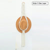 A light beige macrame hat organizer with a wooden dowel is shown against a white background.