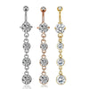 A set of five gold tone butterfly and flower belly rings displayed against a white background.