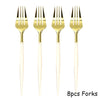 Eight pieces of gold disposable forks with white handles