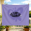A purple flag tapestry featuring a silhouette of a person and the name Olivia Rodrigo.