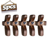 Five wooden pocket crosses for prayer and reflection displayed on a wooden hanger.