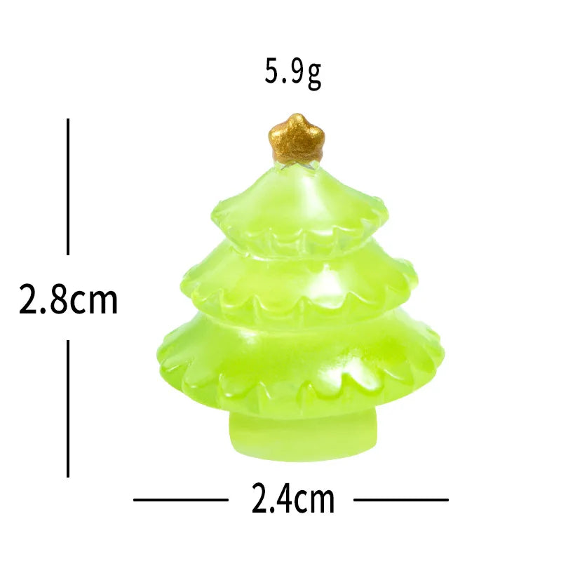 A small, bright lime green resin Christmas tree charm with a gold topper.