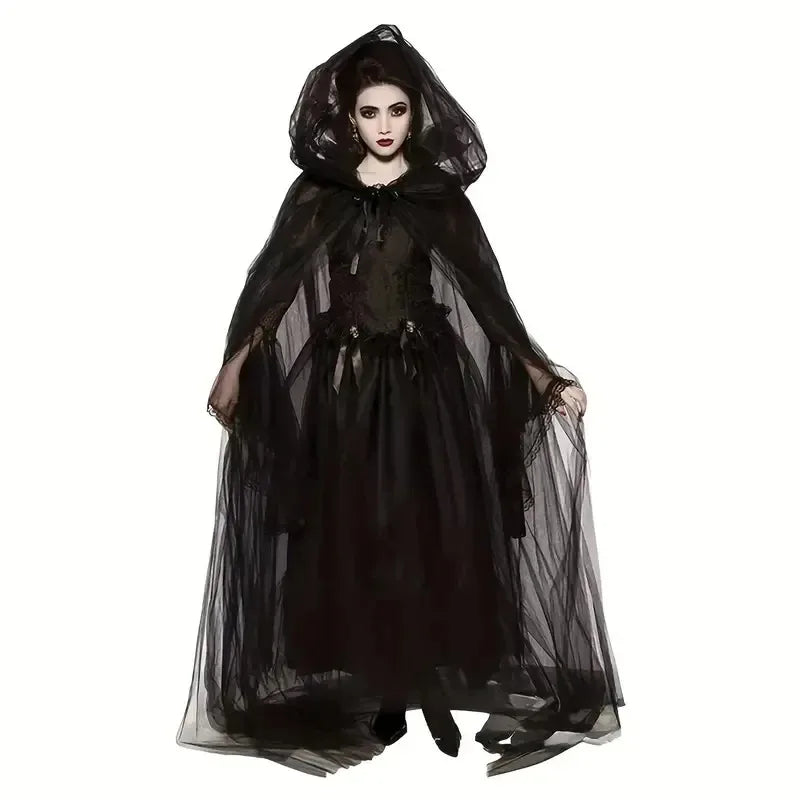Model in an elegant black bridal witch cloak with a sheer veil and dark fabric.