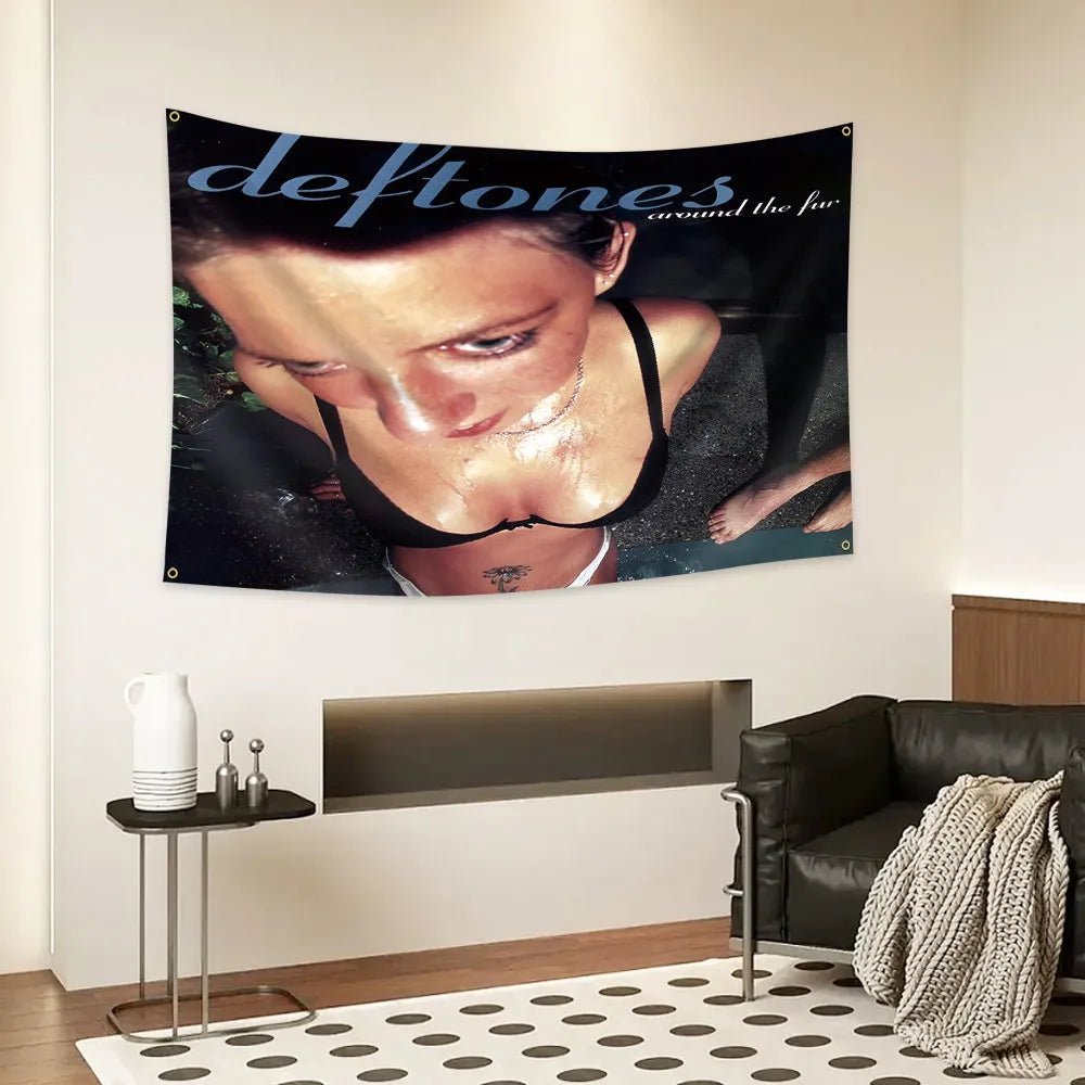 A black and white poster featuring a close-up of a woman's face with tears, titled Deftones around the fire.
