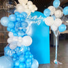 A large balloon arch featuring blue and white latex balloons for a birthday party decoration.