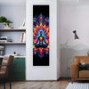 A vertical tapestry featuring a vibrant, colorful chakra design with a meditating figure against a dark background.