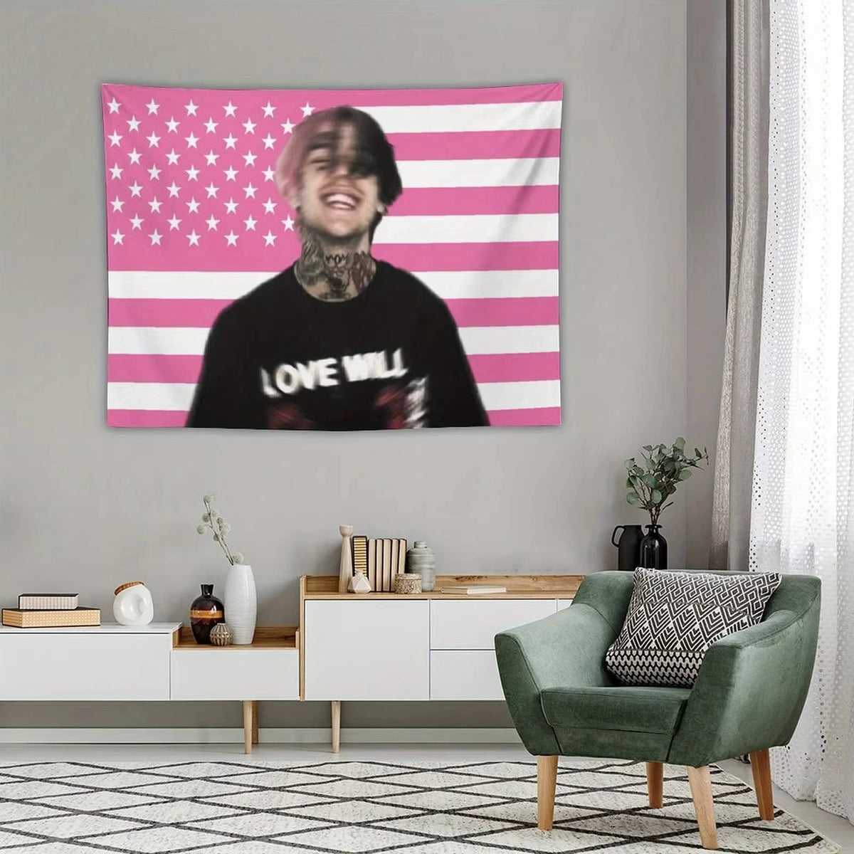 A pink and white striped tapestry featuring a portrait of a person with a beard against an American flag background.