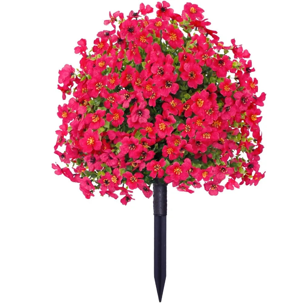 A dense bouquet of bright pink and red artificial eucalyptus violet flowers on a black stem.