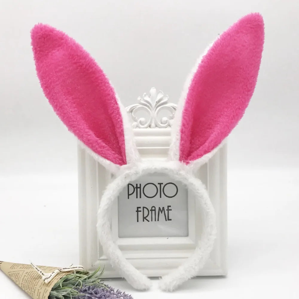 White bunny ear headband with pink fuzzy ears and a photo frame display