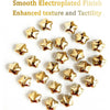 A collection of fifteen gold star-shaped electroplated fridge magnets with a smooth finish.