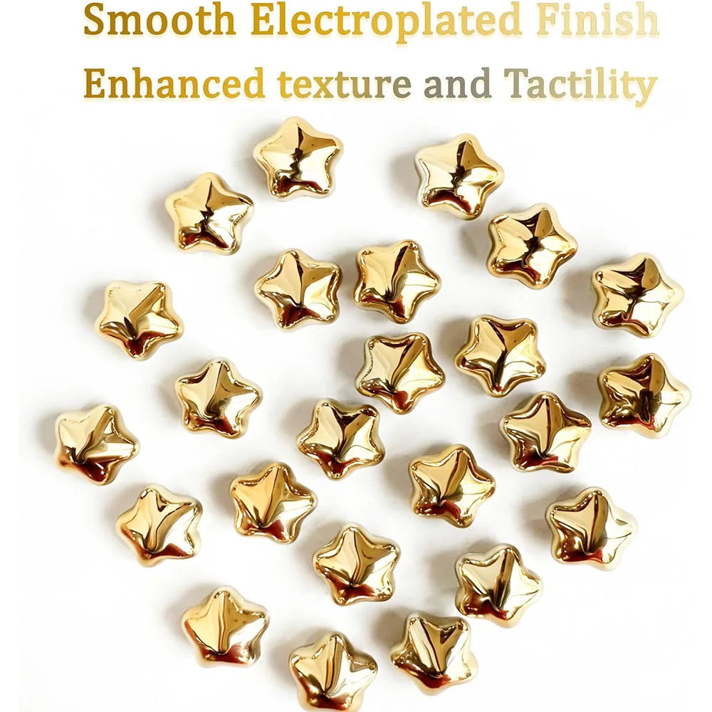 A collection of fifteen gold star-shaped electroplated fridge magnets with a smooth finish.