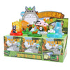 A blind box featuring a lamp ornament and various figurines related to Miyazaki fairy tales.