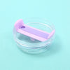 A purple replacement tumbler lid with a sliding mechanism is shown inside a clear glass jar.