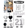 A set of black and white balloons and a silver birthday banner for party decoration