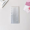 A transparent photocard album with a clear plastic cover featuring a mushroom hole design.