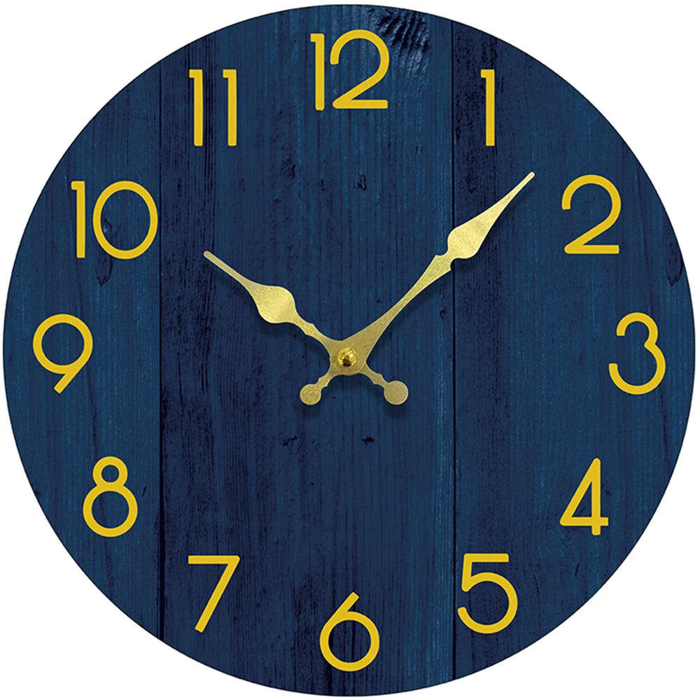 A dark blue wooden wall clock face with gold-colored hands and numbers.
