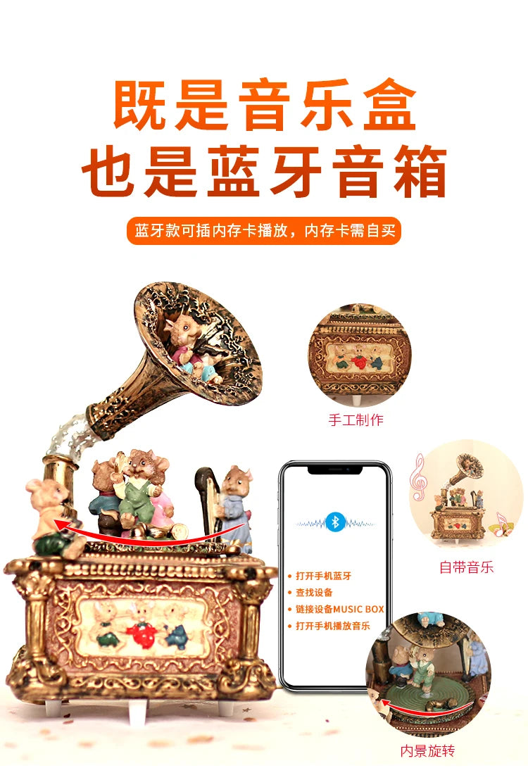 A brass carousel music box decoration with figurines and a modern smartphone displaying music.