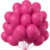 A cluster of bright pink latex balloons tied together for party decoration.