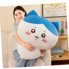 A white and blue Usagi Chiikawa plush doll is being held by a woman in a light gray shirt.