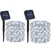 A set of solar powered fairy lights with solar panels for outdoor garden décor
