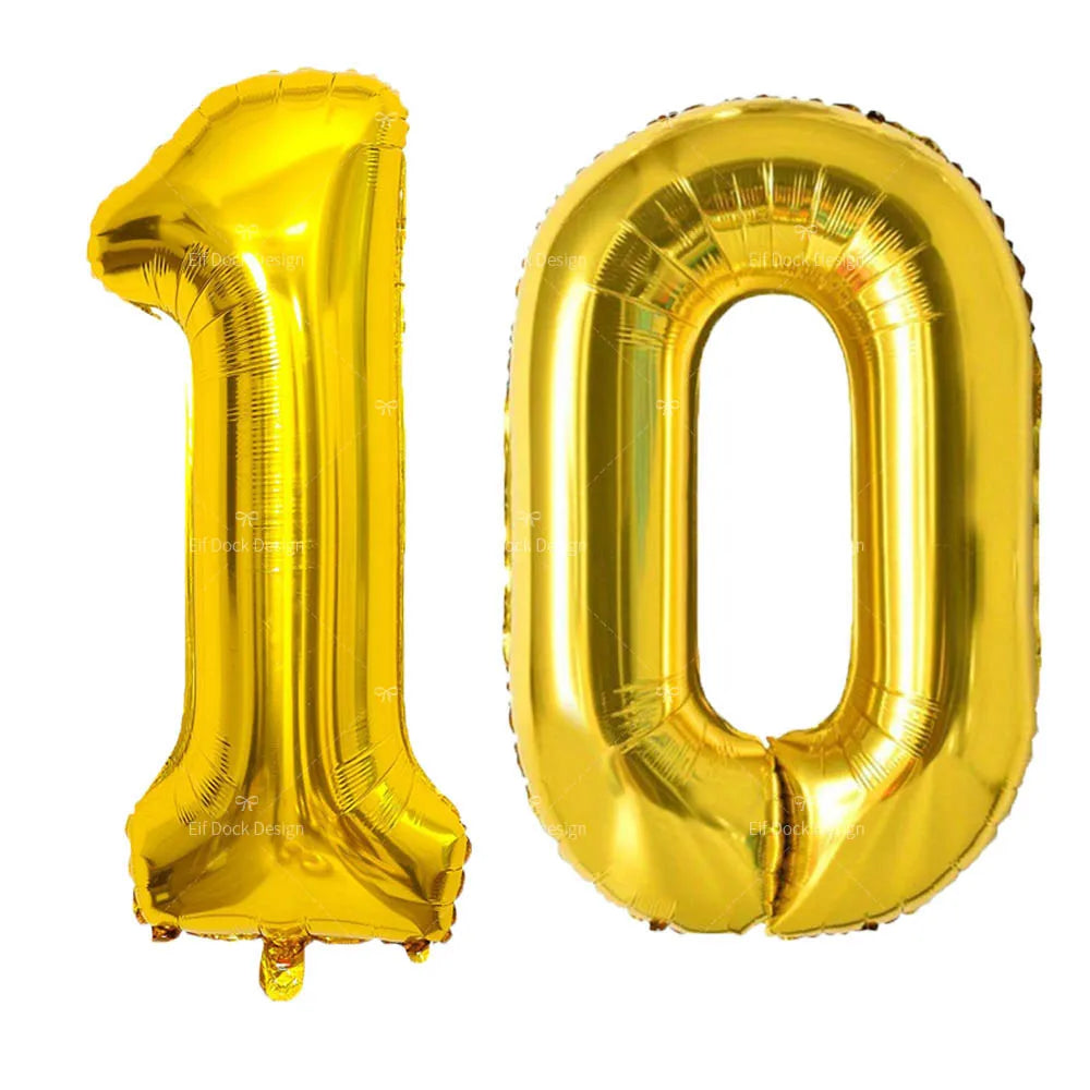A large, shiny gold foil balloon shaped like the number 10.
