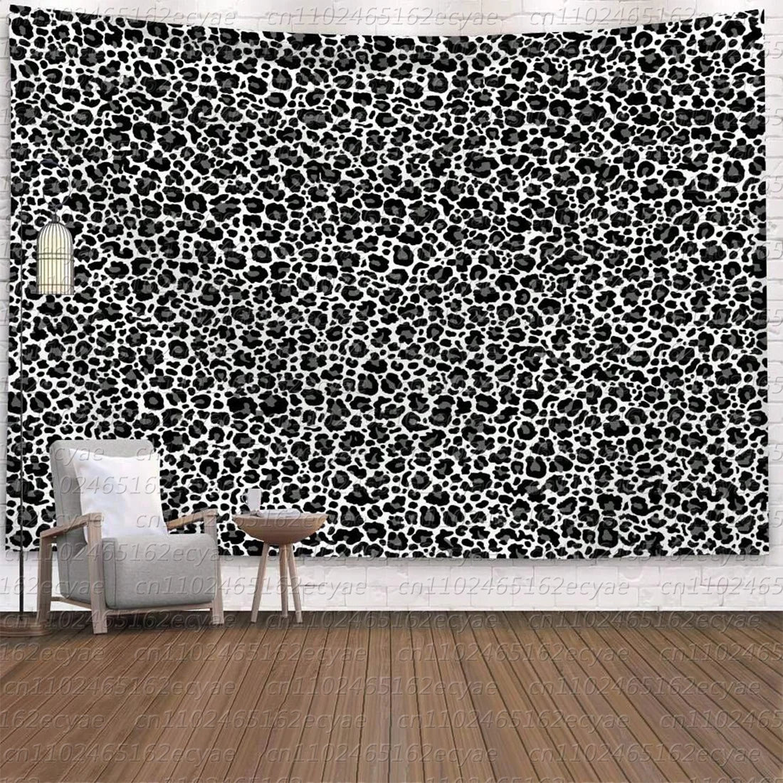 A black and white leopard print wall tapestry featuring a modern chair in the foreground.