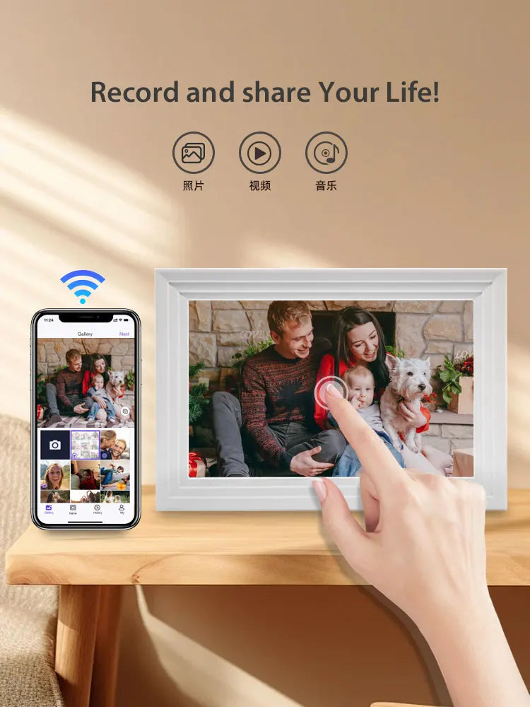 A white digital photo frame displaying a family, next to a smartphone showing a recording interface.