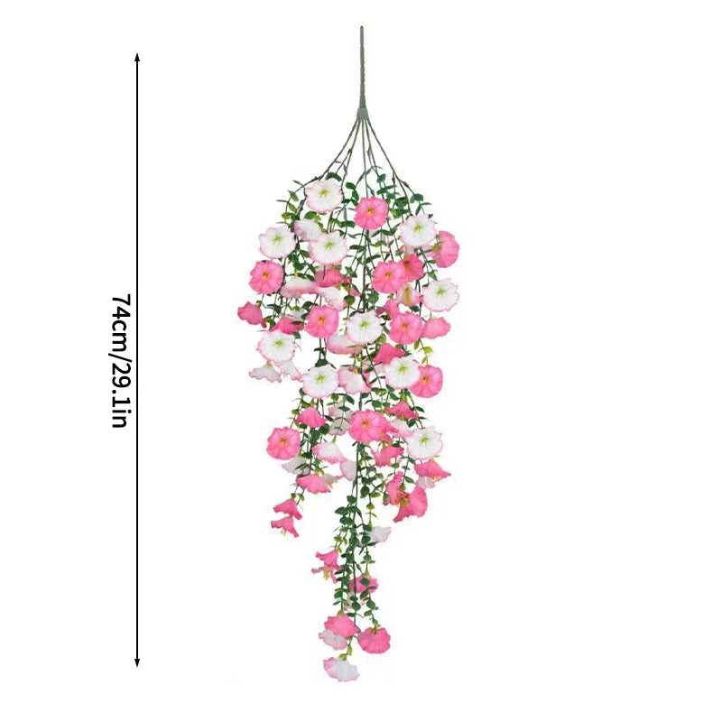 A hanging silk morning glory vine with pink and white flowers used for home decor.