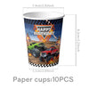 A paper cup featuring a monster truck birthday theme with vehicles and checkered flags.