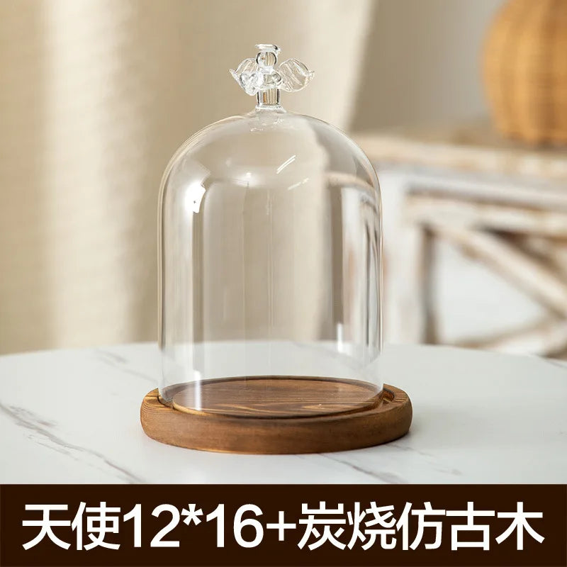 Clear glass aromatherapy candle holder with a wooden base and dust-proof cover