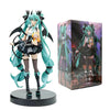 A PVC collectible figurine of Hatsune Miku in a teal outfit with black hair and accessories, displayed next to its packaging 