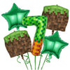 A set of green and brown pixelated balloons and tableware for a miner-themed birthday party.