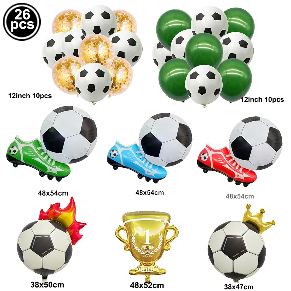 A collection of various soccer balls and football-themed party décor items including inflatable balls, sports shoes, and a tr