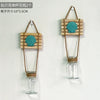 Two wooden and straw macrame plant hangers with blue seashell decorations for indoor plants